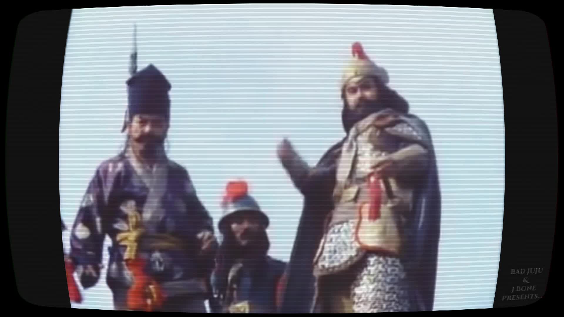 TV screen with three people dressed in Genghis Khan garb