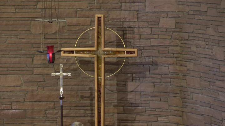 Brick background with crosses in front