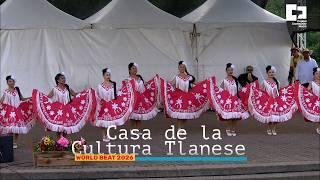 White tent background with women in red skirts dancing on a stage. "Casa de la Cultura Tlanese" at the bottom