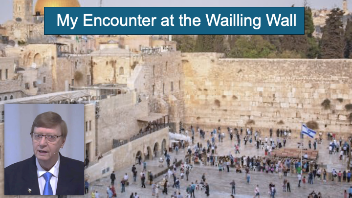 Picture of the Wailing wall with a blue header at the the top and white words: "My Encounter at the Wailling Wall". A thumbnail of a man in a blue suit in the bottom left corner.