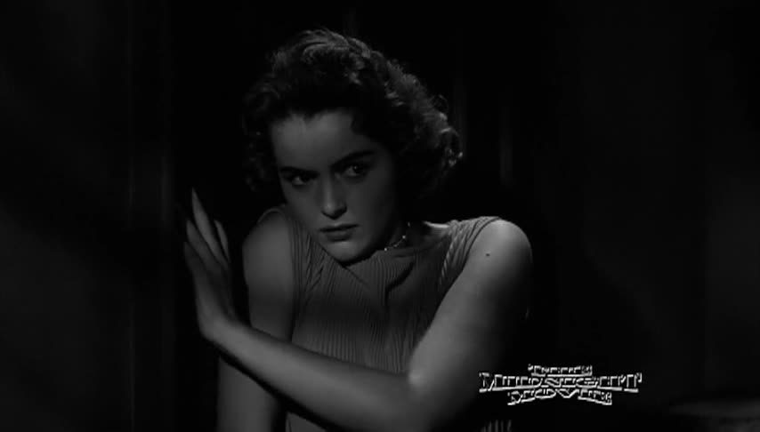 Black and white movie clip with a woman in the center