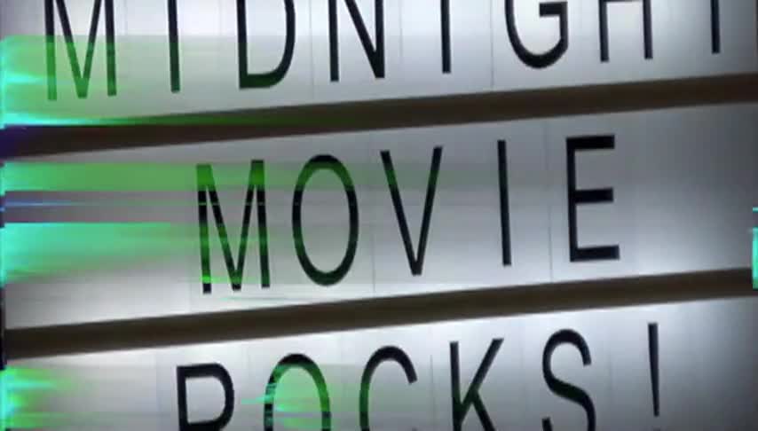 Letter board that says Midnight Movie Rocks