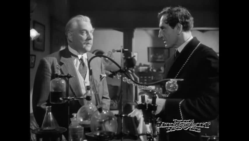 Black and white movie clip with an older man on the left and another man on the right
